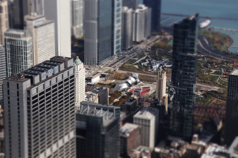 Stunning aerial view of Chicago's high-rise buildings and parks. A blend of urban architecture and nature.